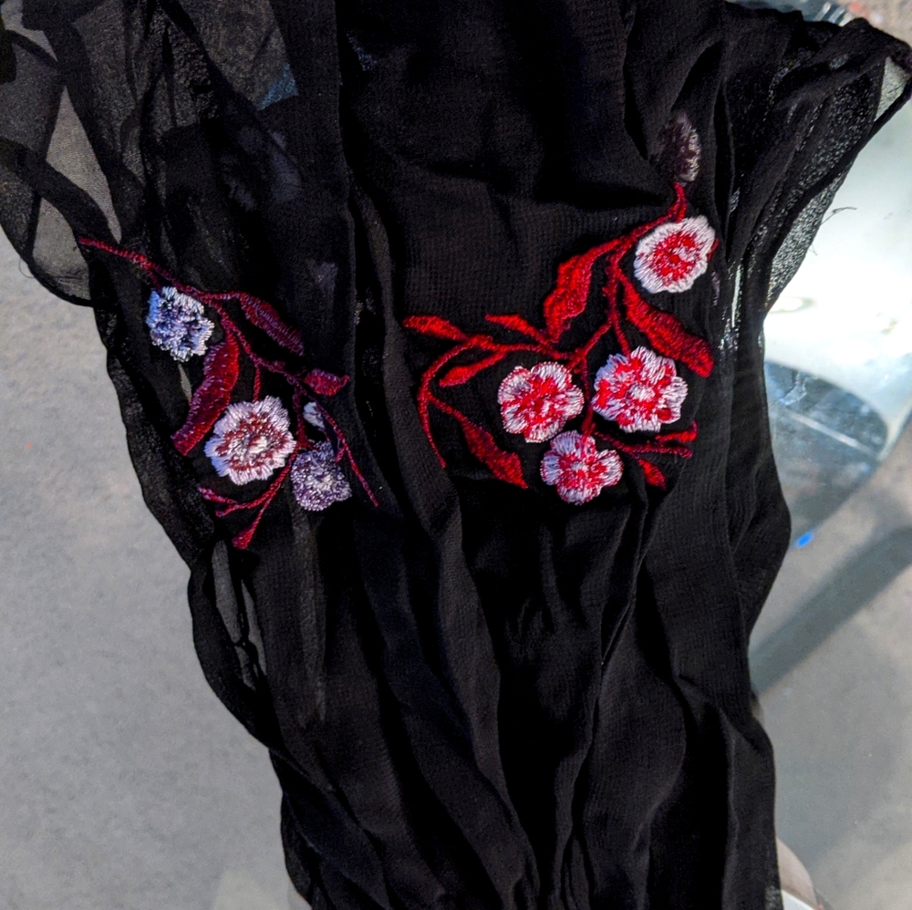 Two thin ruffled scarves